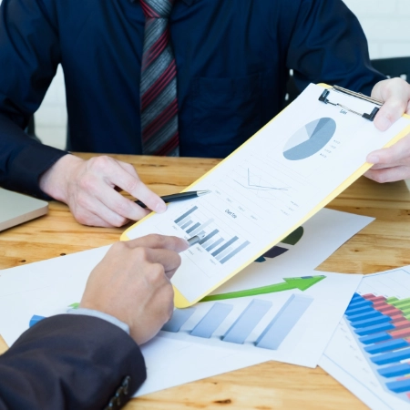 Audit consulting team discussion and business compliance review